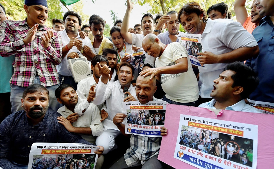 Indian Youth Congress activists also held a protest against the violence with female students in BHU, in New Delhi on Sunday. PTI BHU students' protests take a violent turn as police lathicharge women; Yogi Adityanath orders inquiry