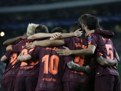 Champions League: Barcelona labour to victory at Sporting Lisbon to stay top of group Champions League: Barcelona labour to victory at Sporting Lisbon to stay top of group