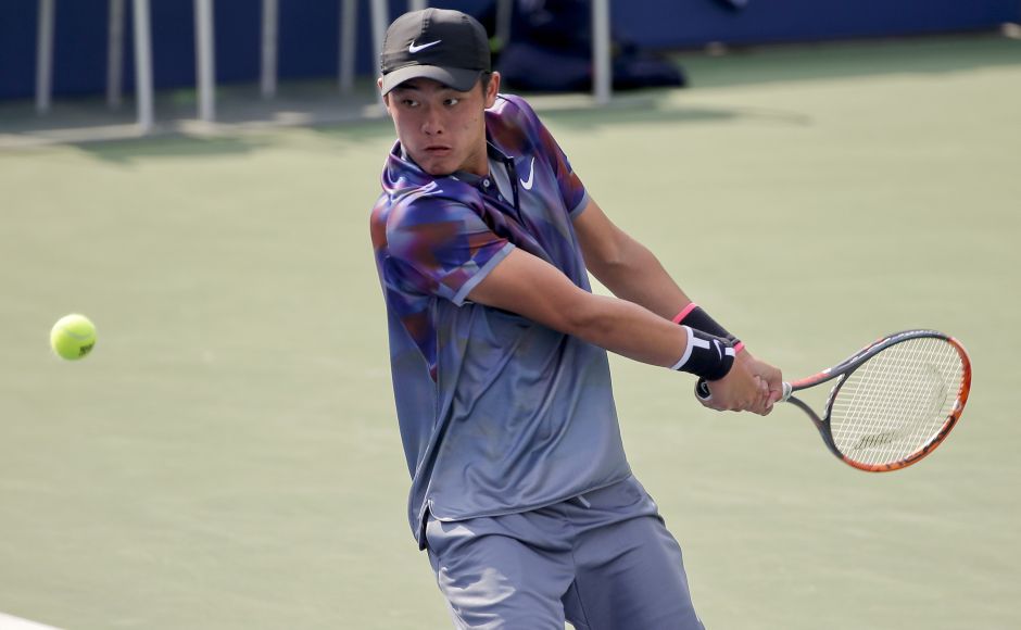 Wu Yibing, of China, won the US Open boys' singles title against Axel Geller, of Argentina. AP Wu Yibing, of China, won the US Open boys' singles title against Axel Geller, of Argentina. AP