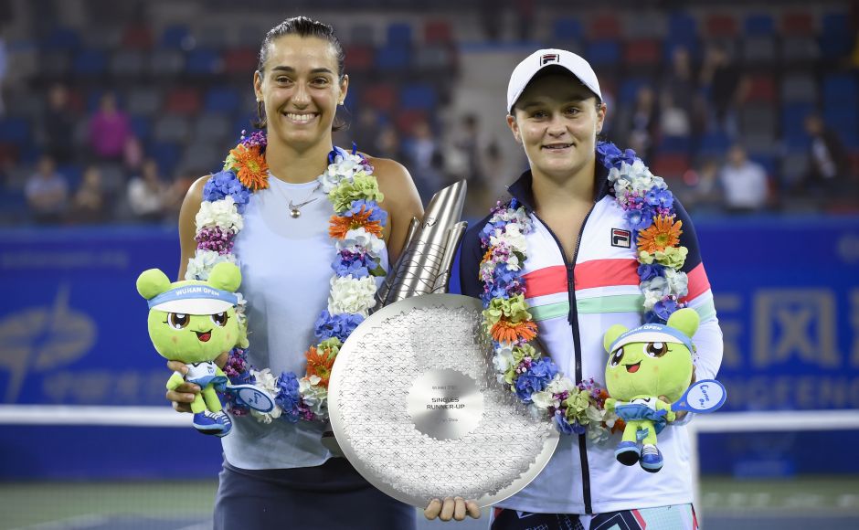 Wuhan Open winner Caroline Garcia of France (L) and runner-up Ashleigh Barty of Australia pose with their trophies. Caroline Garcia fired 32 winners and served eight aces, winning eight out of 16 break points to prevail in two hours and 43 minutes. AFP Wuhan Open winner Caroline Garcia of France (L) and runner-up Ashleigh Barty of Australia pose with their trophies. Caroline Garcia fired 32 winners and served eight aces, winning eight out of 16 break points to prevail in two hours and 43 minutes. AFP