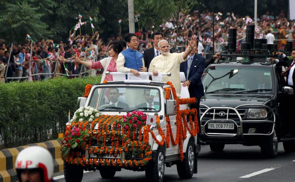 Immediately after the welcome ceremony, Abe, his wife, and Modi set-off on an eight kilometer roadshow for Sabarmati Ashram. This is the first time that Modi has held a joint road show with a visiting head of government of a foreign country. PTI Immediately after the welcome ceremony, Abe, his wife, and Modi set-off on an eight kilometer roadshow for Sabarmati Ashram. This is the first time that Modi has held a joint road show with a visiting head of government of a foreign country. PTI