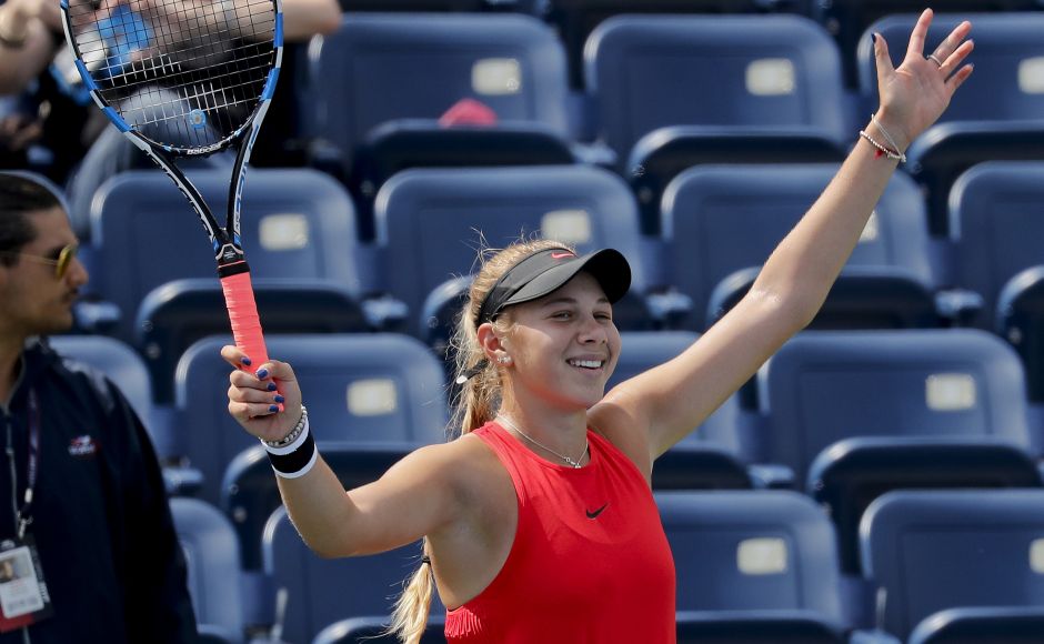 Amanda Anisimova, of the United States, reacts after winning the junior girls singles championship game over Cori Gauff, of the United States, during junior girls singles final. Amanda Anisimova, of the United States, reacts after winning the junior girls singles championship game over Cori Gauff, of the United States, during junior girls singles final.