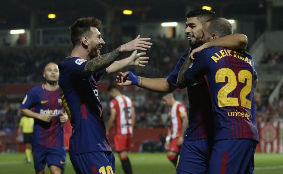 Barcelona made it six wins in as many games in La Liga on Saturday when it won 3-0 at Girona thanks to Luiz Suarez and a pair of own goals by the hosts. AP Barcelona's Luiz Suarez scores in 100th La Liga appearance, Real Madrid win on Cristiano Ronaldo's return