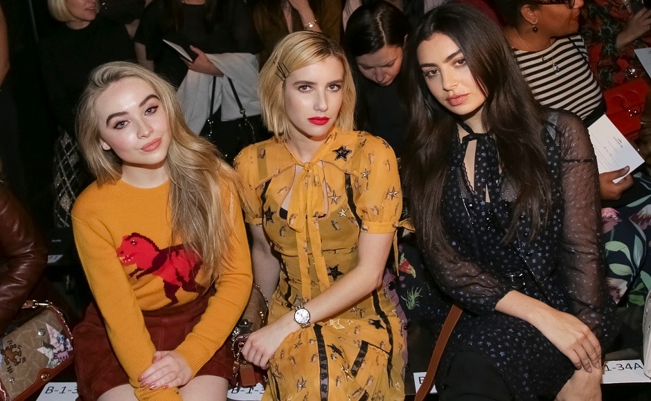 Sabrina Carpenter, Emma Roberts, and Charli XCX were seated together at the event, in the front row. Image from AP. Sabrina Carpenter, Emma Roberts, and Charli XCX were seated together at the event, in the front row. Image from AP.
