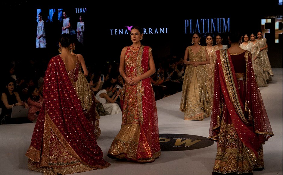 Models present creations by designer Tena Durrani during the Pakistan Spring/Summer 2017 Fashion Show Week in Karachi, Pakistan, on Thursday, 14 September, 2017. Image courtesy: AP/Shakil Adil Models present creations by designer Tena Durrani during the Pakistan Spring/Summer 2017 Fashion Show Week in Karachi, Pakistan, on Thursday, 14 September, 2017. Image courtesy: AP/Shakil Adil