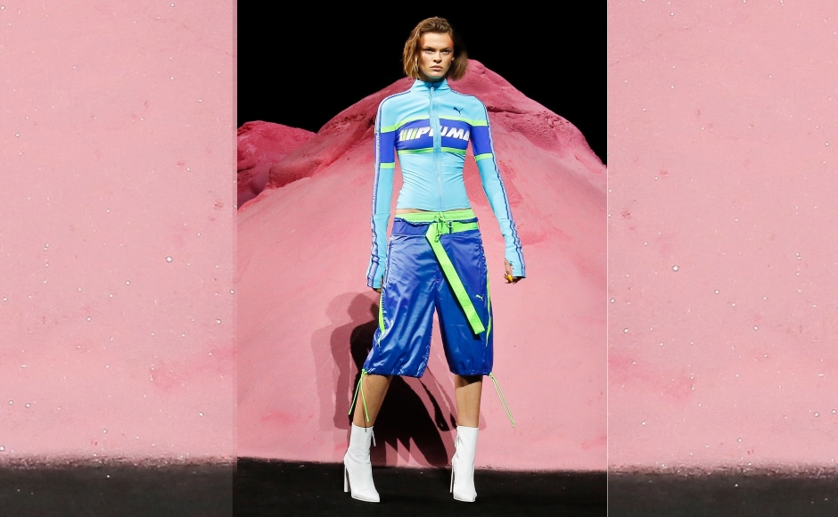 The show saw a burst of colour as models strutted down the runway. Image from AP. The show saw a burst of colour as models strutted down the runway. Image from AP.