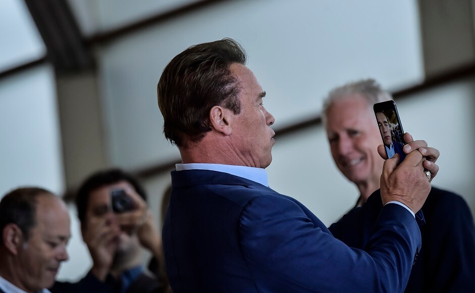 Arnold Schwarzenegger takes a selfie during the photo call to promote the film Wonders Of The Sea. Image from AP Arnold Schwarzenegger promotes Wonders Of The Sea at San Sebastian Film Festival, greets fans
