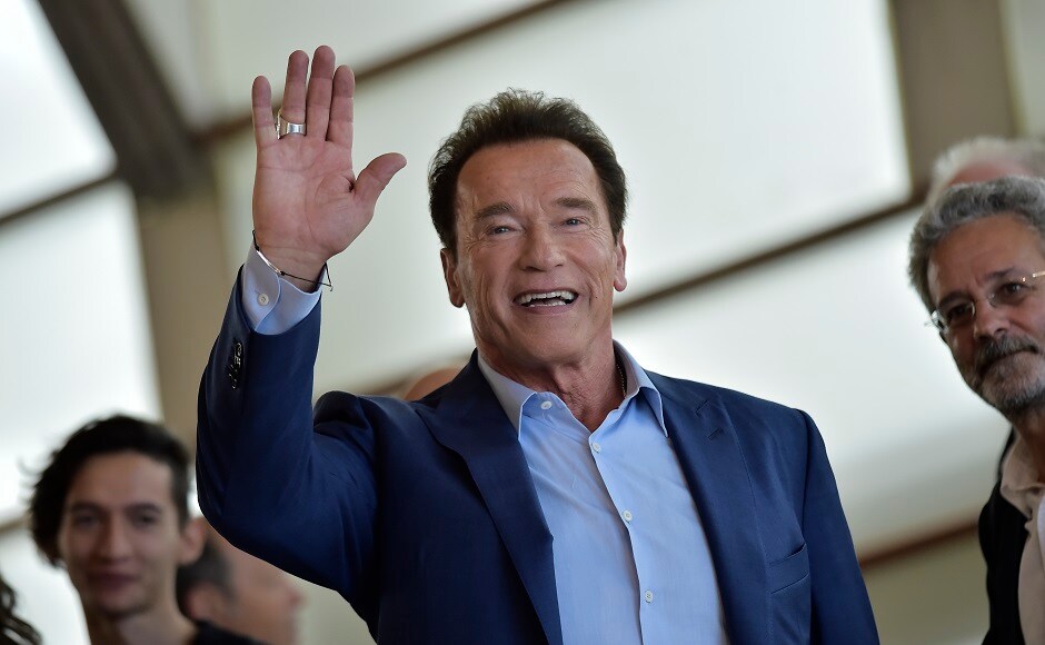 Arnold Schwarzenegger waves during the photo call to promote the film Wonders Of The Sea, at the 65th San Sebastian Film Festival. Image from AP Arnold Schwarzenegger promotes Wonders Of The Sea at San Sebastian Film Festival, greets fans