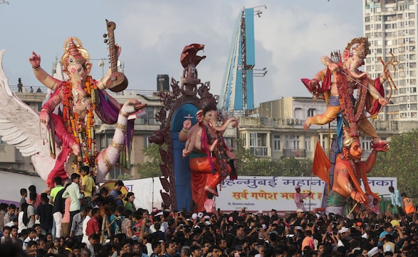 As 10-day Ganesh festival draws to a close, idols are immersed into the sea, amid chaos and colour As 10-day Ganesh festival draws to a close, idols are immersed into the sea, amid chaos and colour