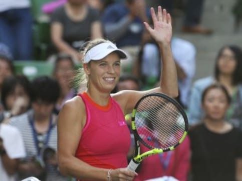 Caroline Wozniacki hopes to rise to the top again after defending Pan Pacific Open title Caroline Wozniacki hopes to rise to the top again after defending Pan Pacific Open title