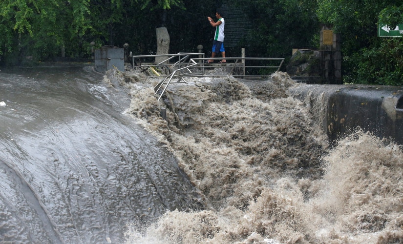 The weather bureau has warned that continued moderate to heavy rains in Manila and nearby provinces along the cyclone's path may trigger flash floods and landslides. Reuters The weather bureau has warned that continued moderate to heavy rains in Manila and nearby provinces along the cyclone's path may trigger flash floods and landslides. Reuters