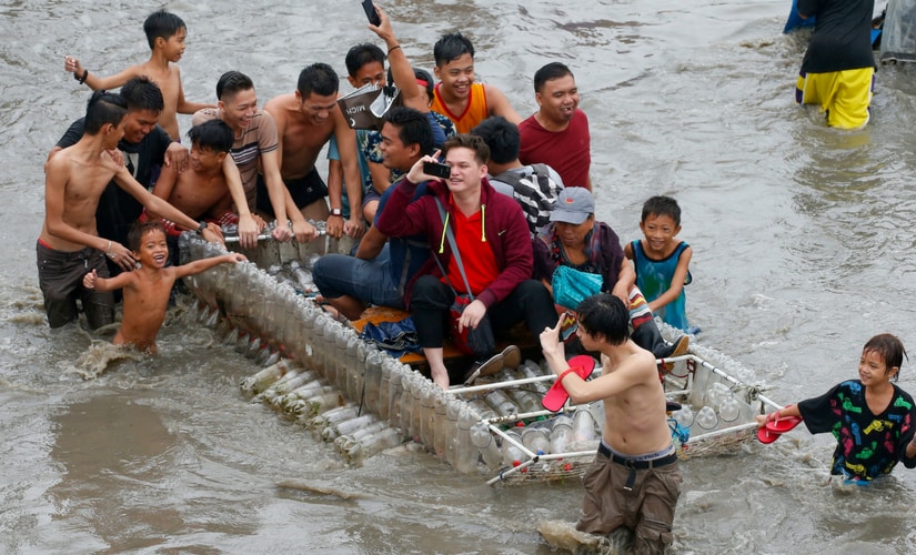 A tropical depression dumped heavy rains in the Philippines early Tuesday, flooding metropolitan Manila and nearby provinces and causing a landslide that killed two brothers. AP A tropical depression dumped heavy rains in the Philippines early Tuesday, flooding metropolitan Manila and nearby provinces and causing a landslide that killed two brothers. AP