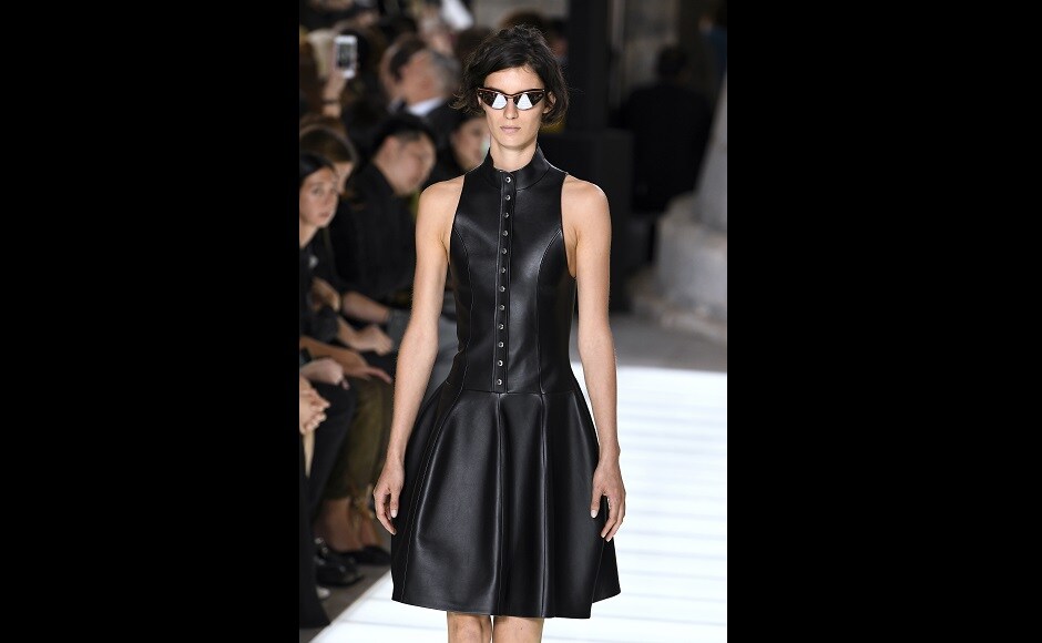 A model presents a black dress from this Spring/Summer ready-to-wear collection fashion show. Image from AFP Louis Vuitton presents collection at Spring/Summer ready-to-wear fashion show in Paris