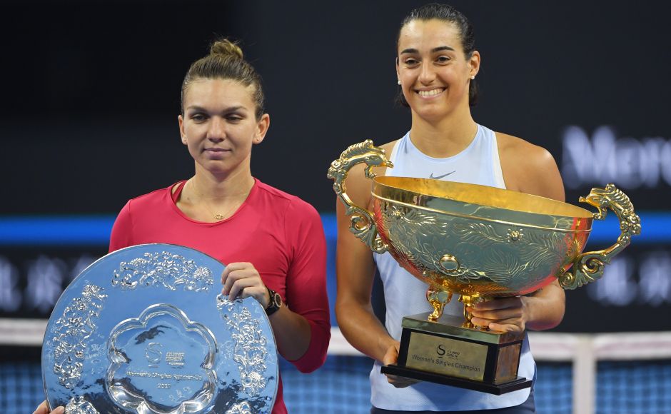 The 15th-ranked Garcia, who lost to Halep the two previous times they played, won her second consecutive WTA title. The Frenchwoman will make her top-10 debut when the new rankings come out on Monday. AFP Rafael Nadal wins 6th title of year at China Open; Caroline Garcia upsets newly crowned World No 1 Simona Halep