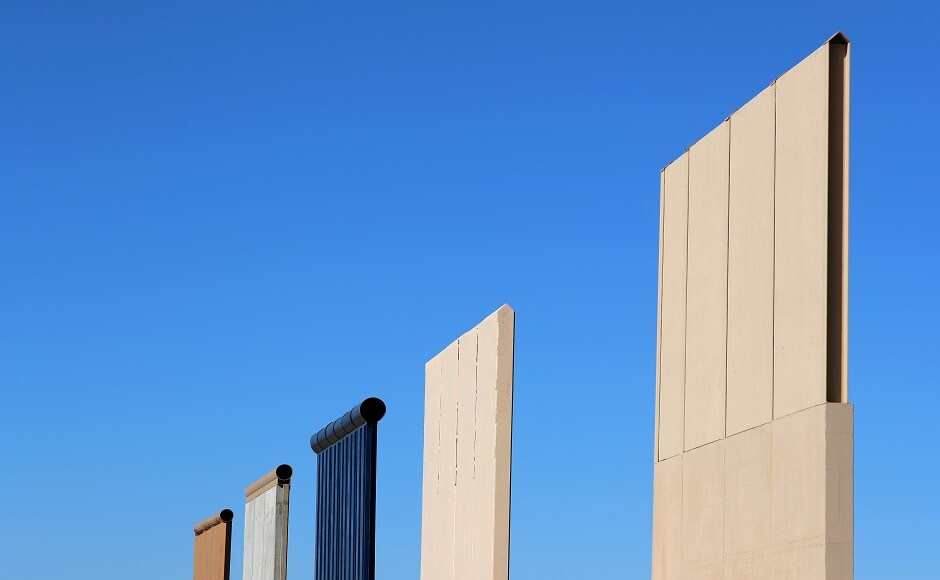 A couple of miles from the bustling Otay Mesa border crossing in San Diego, eight towering chunks of concrete and steel stand as high as 30 feet tall against the sky, possible models for what Trump has promised will one day be a solid wall extending the full length of the southern border, from California to Texas. Reuters A couple of miles from the bustling Otay Mesa border crossing in San Diego, eight towering chunks of concrete and steel stand as high as 30 feet tall against the sky, possible models for what Trump has promised will one day be a solid wall extending the full length of the southern border, from California to Texas. Reuters