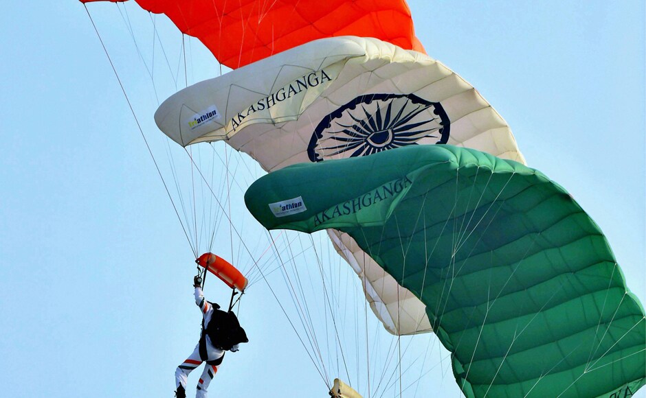 Members of Akash Ganga Sky diving team display their skill during the parade at Hindon Air Force base in Ghaziabad. PTI Stellar show adorns the skies at IAF's 85th Air Force Day parade in Ghaziabad