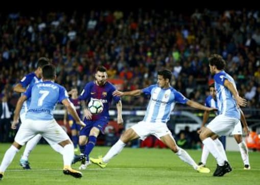 La Liga: Barcelona stride past Malaga to consolidate top spot amidst Catalan chaos; Valencia thrash Sevilla La Liga: Barcelona stride past Malaga to consolidate top spot amidst Catalan chaos; Valencia thrash Sevilla