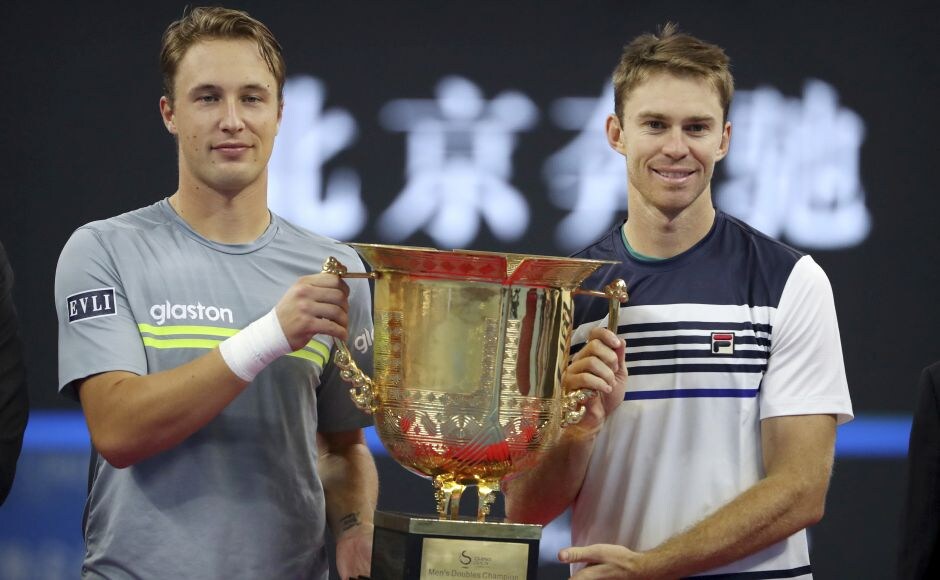 Henri Kontinen (L) and John Peers pose with the winners' trophy after beating John Isner and Jack Sock in the men's doubles championship. AP Rafael Nadal wins 6th title of year at China Open; Caroline Garcia upsets newly crowned World No 1 Simona Halep