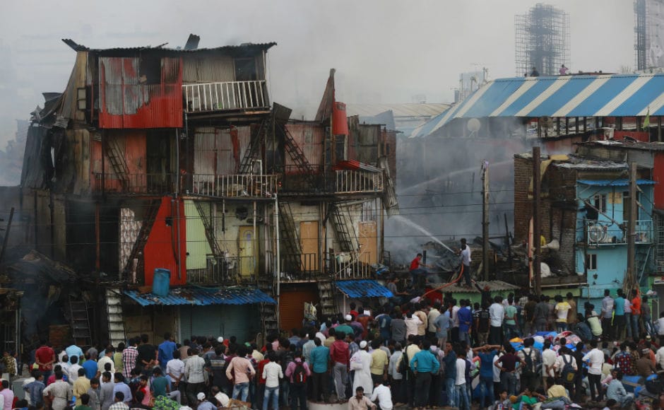A major fire broke out at Bandra's Garib Nagar slum in Mumbai on Thursday afternoon during a demolition drive and engulfed around 300 hutments and injured four, including one fireman. AP Massive fire breaks out in Mumbai’s Bandra slums; four, including one fireman, injured