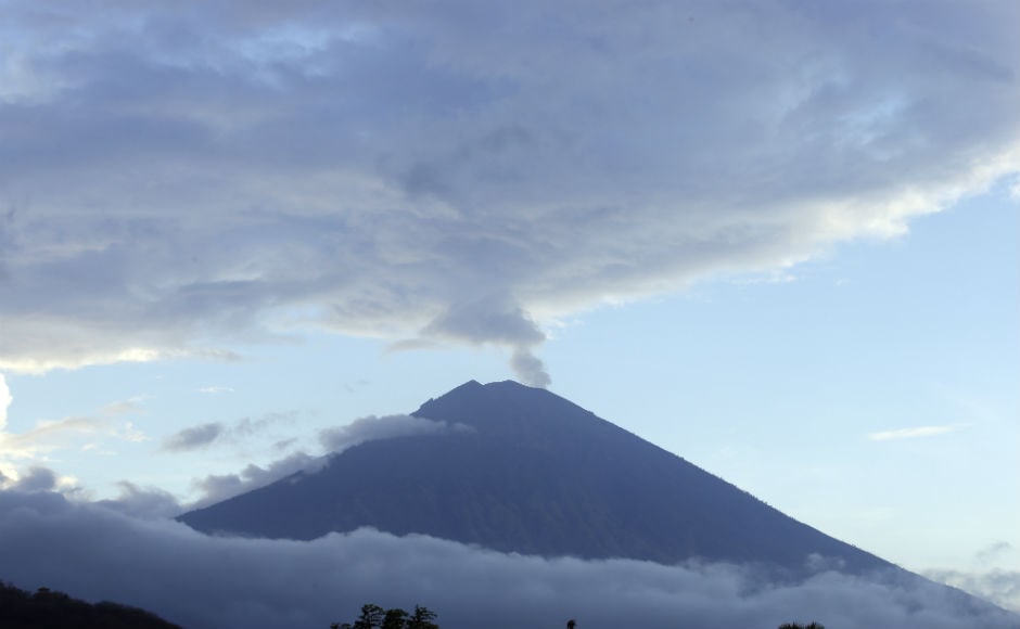Mount Agung, a rumbling volcano towering over the east of the Indonesian island of Bali, has forced more than 140,000 people to flee as authorities warn that it can erupt at any time. AP Fear of Bali volcano eruption sparks panic in Indonesia; over 140,000 evacuated