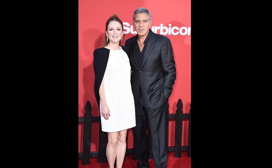 Julianne Moore (left) and George Clooney pose for the photographers at Suburbicon's LA premiere. Photo by Jordan Strauss/Invision/AP Julianne Moore (left) and George Clooney pose for the photographers at Suburbicon's LA premiere. Photo by Jordan Strauss/Invision/AP