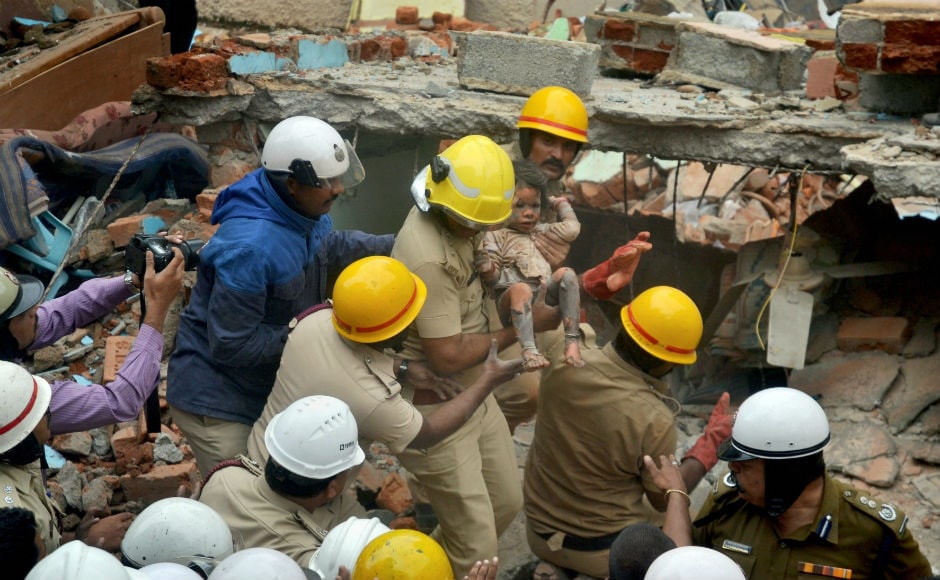 Three-year old Sanjana was the youngest survivor of the collapse. Eyewitnesses said the blast took place around 7 am, bringing down a large portion of the 20-year-old building. Forty fire brigade and National Disaster Response Force (NDRF) personnel rushed to the spot. PTI Building collapses in Bengaluru's Ejipura: Seven die in suspected cylinder blast