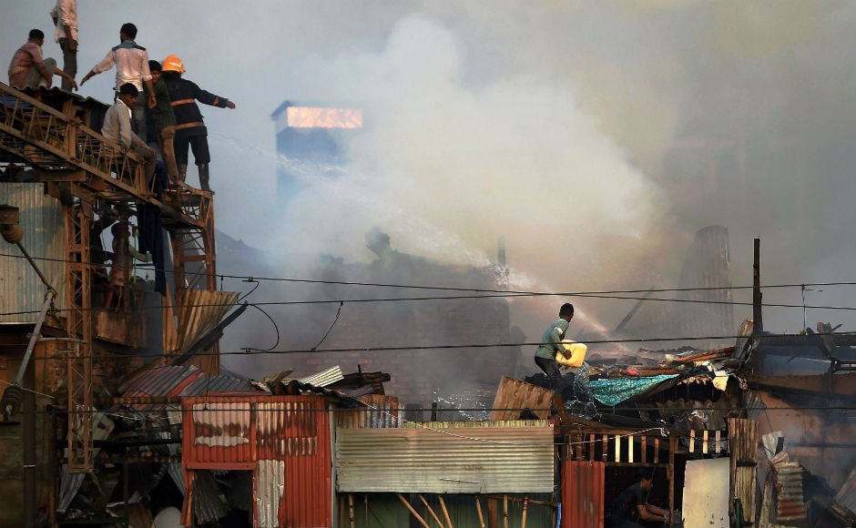 The fire was classified as level IV, the second highest level of severity, and 17 water tankers and 9 fire engines were pressed into service to douse the massive blaze. Officals managed to bring the fire under control only by late evening. Huge tufts of smokes could be seen billowing over Bandra station. PTI Massive fire breaks out in Mumbai’s Bandra slums; four, including one fireman, injured