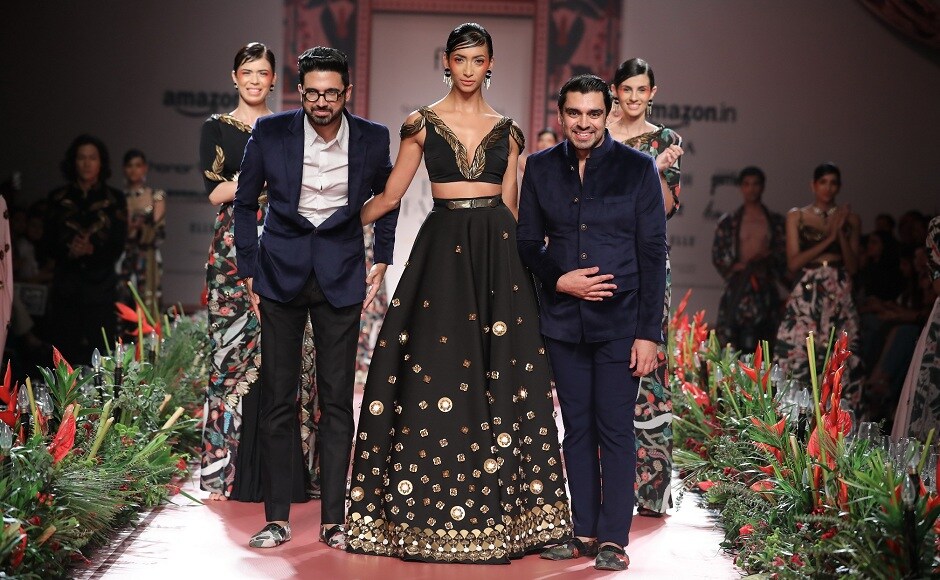 The designer-duo takes a bow after a stunning show. The designer-duo takes a bow after a stunning show.