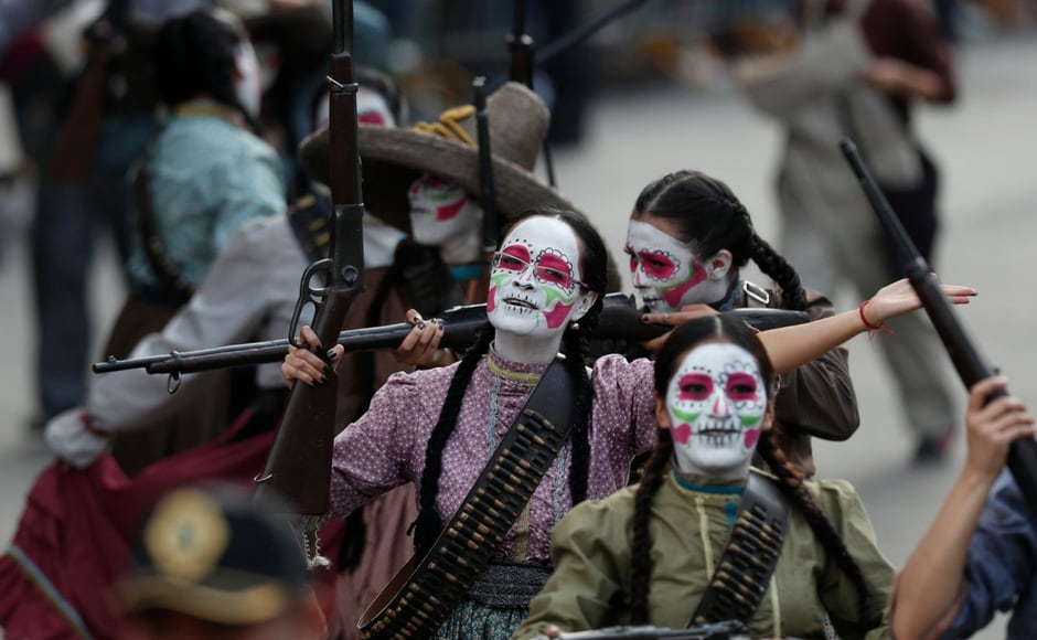 This year's parade featured a kilometre and a half of floats honouring the celebration, which is an amalgam of pre-Hispanic and other traditions. AP This year's parade featured a kilometre and a half of floats honouring the celebration, which is an amalgam of pre-Hispanic and other traditions. AP