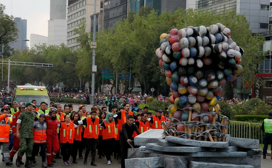 "Many are afraid of death but no, its part of life," said Leo Cancino, who took his family to see the parade in Mexico City. AP "Many are afraid of death but no, its part of life," said Leo Cancino, who took his family to see the parade in Mexico City. AP
