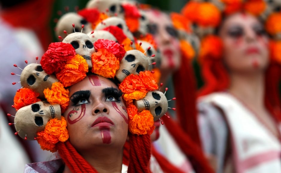 But it is increasingly celebrated with parade rife with floats, giant skeleton marionettes and thousands of participants. AP But it is increasingly celebrated with parade rife with floats, giant skeleton marionettes and thousands of participants. AP