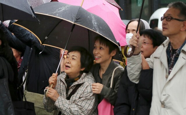 "I think the most serious threat we face now is North Korea situation. I feel prime minister Abe has been showing best tactics to handle the situation compared to other politicians," said 51-year-old voter, Naomi Mochida. AP "I think the most serious threat we face now is North Korea situation. I feel prime minister Abe has been showing best tactics to handle the situation compared to other politicians," said 51-year-old voter, Naomi Mochida. AP