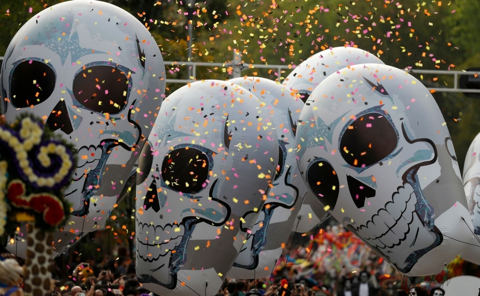Mexico City's central Zocalo plaza was filled by the papier mache dead, skeletal Catrina figures and candle-covered shrines as hundreds gathered to honour the 228 capital residents killed by 19 September earthquake. AP Mexico City's central Zocalo plaza was filled by the papier mache dead, skeletal Catrina figures and candle-covered shrines as hundreds gathered to honour the 228 capital residents killed by 19 September earthquake. AP