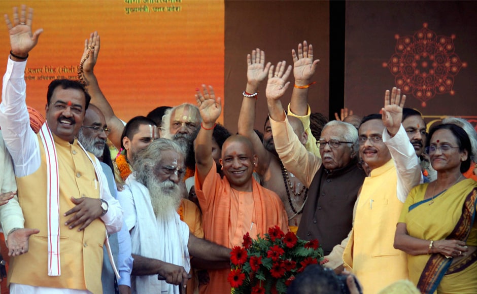 Yogi Adityanath with Governor Ram Naik and other ministers of state Cabinet wave in Ayodhya on Wednesday. The priest-turned-politician said "Ayodhya is my personal belief and it is my duty to develop Ayodhya". PTI Yogi Adityanath with Governor Ram Naik and other ministers of state Cabinet wave in Ayodhya on Wednesday. The priest-turned-politician said "Ayodhya is my personal belief and it is my duty to develop Ayodhya". PTI