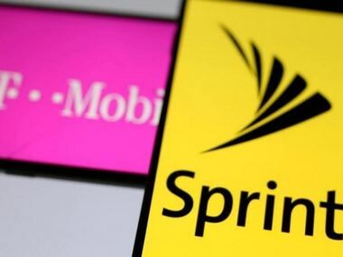 Smartphones with the logos of T-Mobile and Sprint are seen in this illustration. Reuters