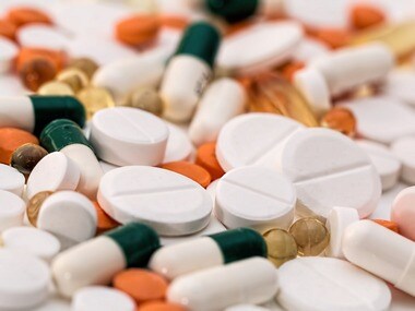 Aspirin is generally trapped inside a capsule or a mesh.