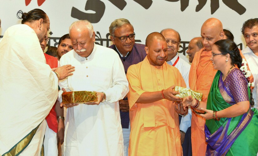 The ceremony for the first edition of the "Bharatama Ashok Ji Singhal Vedic Education Awards" was held in Delhi to encourage and promote Vedic Studies across India. PTI Mohan Bhagwat, Yogi Adityanath share stage at Vedic education awards ceremony in Delhi