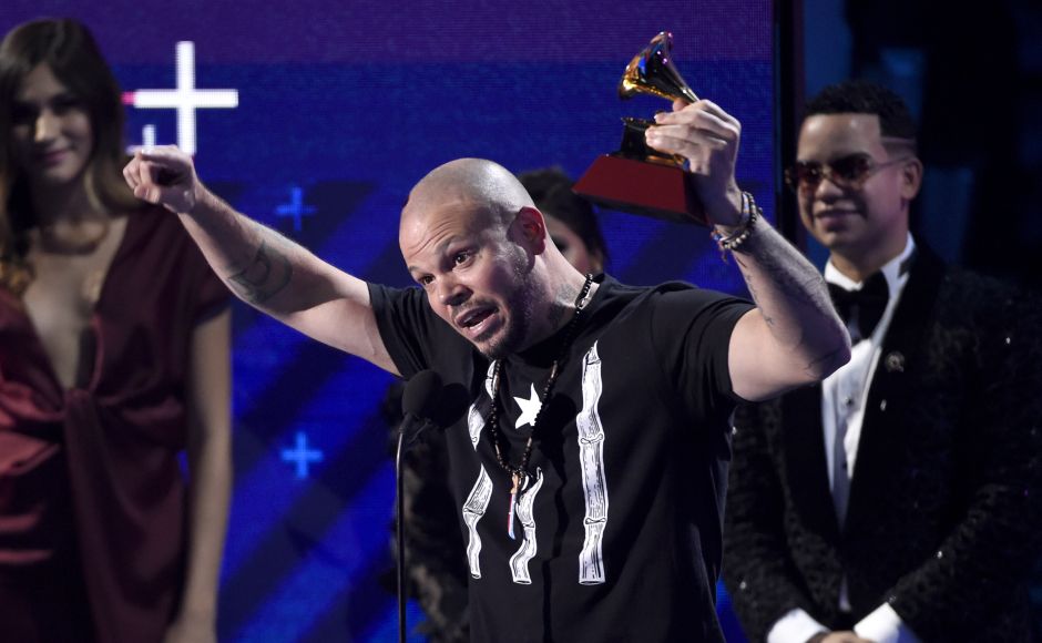 Rapper Residente accepts the award for best urban song for "Somos Anormales". Residente opened the show with a tribute to his homeland, wearing a T-shirt emblazoned with the Puerto Rican flag. AP Rapper Residente accepts the award for best urban song for "Somos Anormales". Residente opened the show with a tribute to his homeland, wearing a T-shirt emblazoned with the Puerto Rican flag. AP