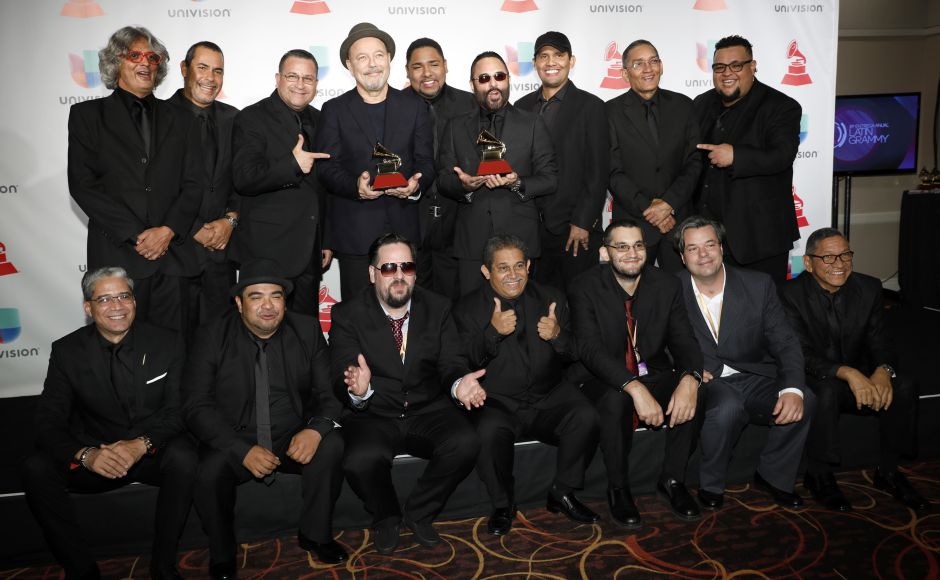 Roberto Delgado (third from left) and his orchestra pose with Ruben Blades (fourth from left), who won the top prize, album of the year, for "Salsa Big Band." AP Roberto Delgado (third from left) and his orchestra pose with Ruben Blades (fourth from left), who won the top prize, album of the year, for "Salsa Big Band." AP