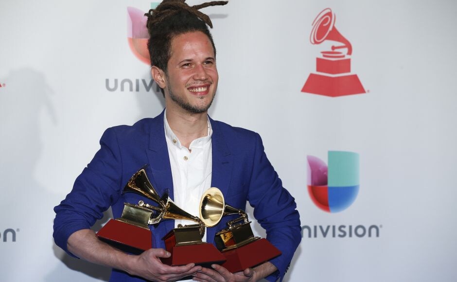 Vicente Garcia poses in the press room with awards for best tropical song for "Bachata En Kingston," best singer-songwriter album for "A La Mar" and best new artist. AP Vicente Garcia poses in the press room with awards for best tropical song for "Bachata En Kingston," best singer-songwriter album for "A La Mar" and best new artist. AP