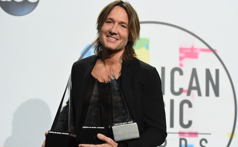Keith Urban won big as he took home three awards for: Favourite Male Artist - Country, Favourite Song - Country for 'Blue Ain't Your Color' and Favourite Album - Country for Ripcord. Image from AP. Keith Urban won big as he took home three awards for: Favourite Male Artist - Country, Favourite Song - Country for 'Blue Ain't Your Color' and Favourite Album - Country for Ripcord. Image from AP.