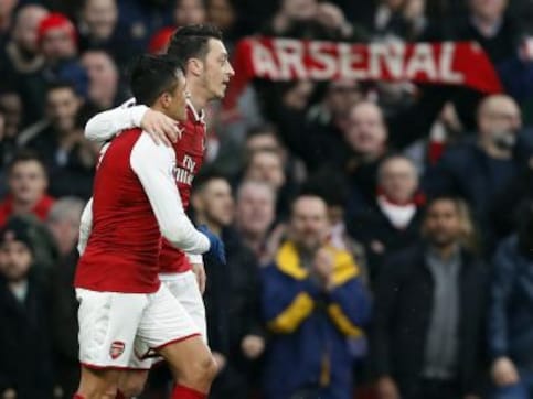 Premier League: Arsene Wenger hails Mesut Ozil's 'fight' after Arsenal thrash Huddersfield Town Premier League: Arsene Wenger hails Mesut Ozil's 'fight' after Arsenal thrash Huddersfield Town
