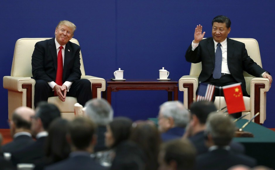 US president Donald Trump and Chinese president Xi Jinping attended a business event at the Great Hall of the People in Beijing on Thursday. AP Donald Trump receives elaborate welcome on first visit to China, holds talks with Xi Jinping
