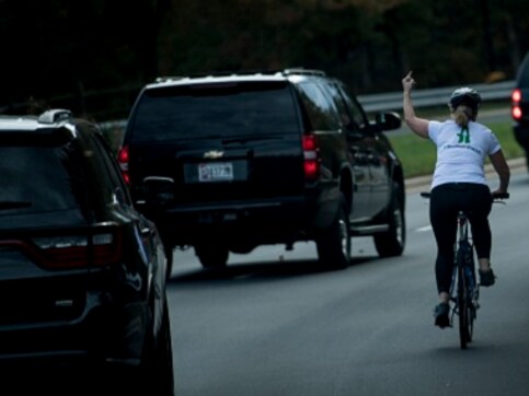 Juli Briskman, woman who gave Donald Trump the middle finger salute, loses her job Juli Briskman, woman who gave Donald Trump the middle finger salute, loses her job