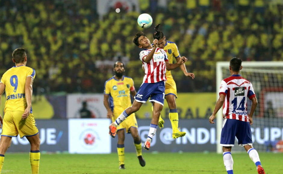 Hitesh Sharma of ATK and Arata Izumi of Kerala Blasters go head-to-head for the ball. ISL Hitesh Sharma of ATK and Arata Izumi of Kerala Blasters go head-to-head for the ball. ISL