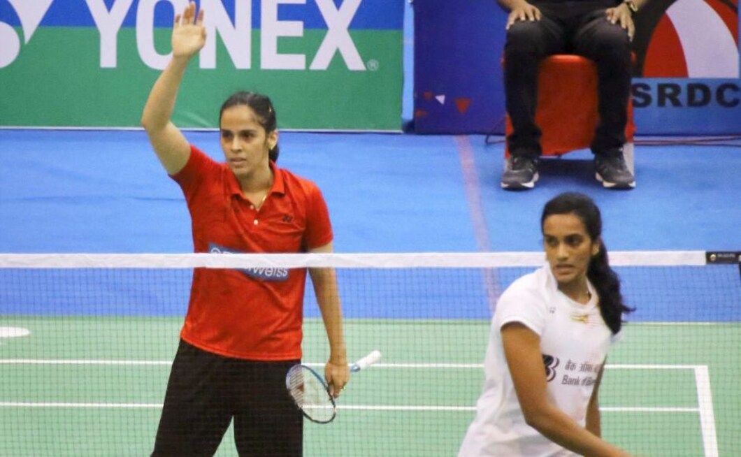 The main event of the day, however, was Saina Nehwal's women's singles final against PV Sindhu. PTI The main event of the day, however, was Saina Nehwal's women's singles final against PV Sindhu. PTI