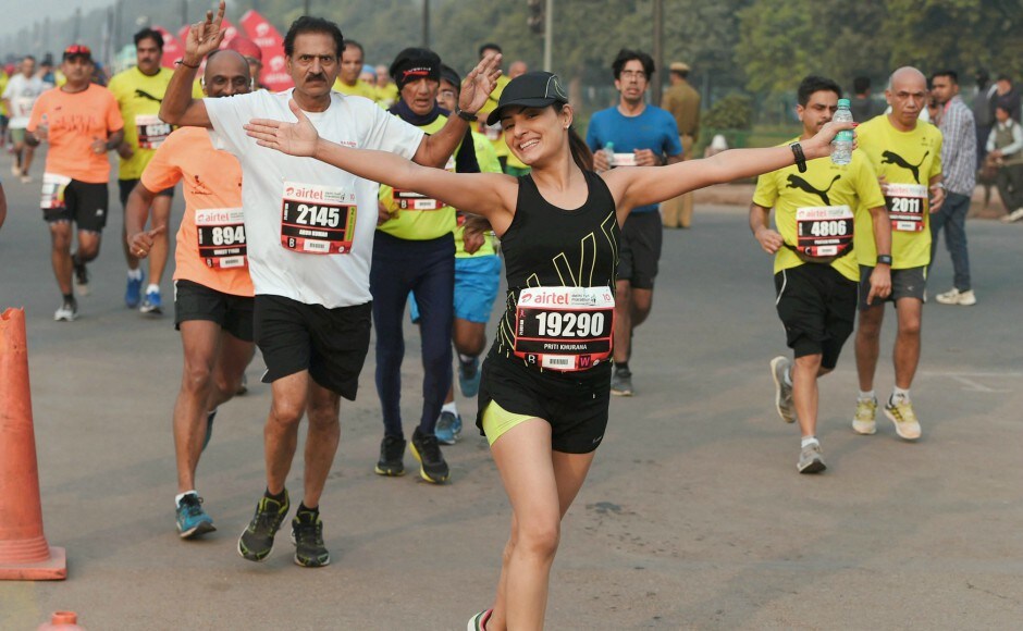 Despite a misty, chilly morning and government- run air monitors showing "very poor" readings, many enthusiastically participated in the half marathon. PTI Despite a misty, chilly morning and government- run air monitors showing "very poor" readings, many enthusiastically participated in the half marathon. PTI