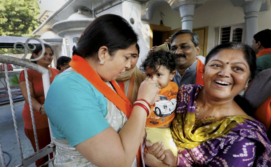 The Union textiles minister conducted door-to-door campaign, and meet the voters. She also challenged Rahul Gandhi for a open debate on about technicalities and issues of textile industry in Surat and Gujarat. PTI The Union textiles minister conducted door-to-door campaign, and meet the voters. She also challenged Rahul Gandhi for a open debate on about technicalities and issues of textile industry in Surat and Gujarat. PTI