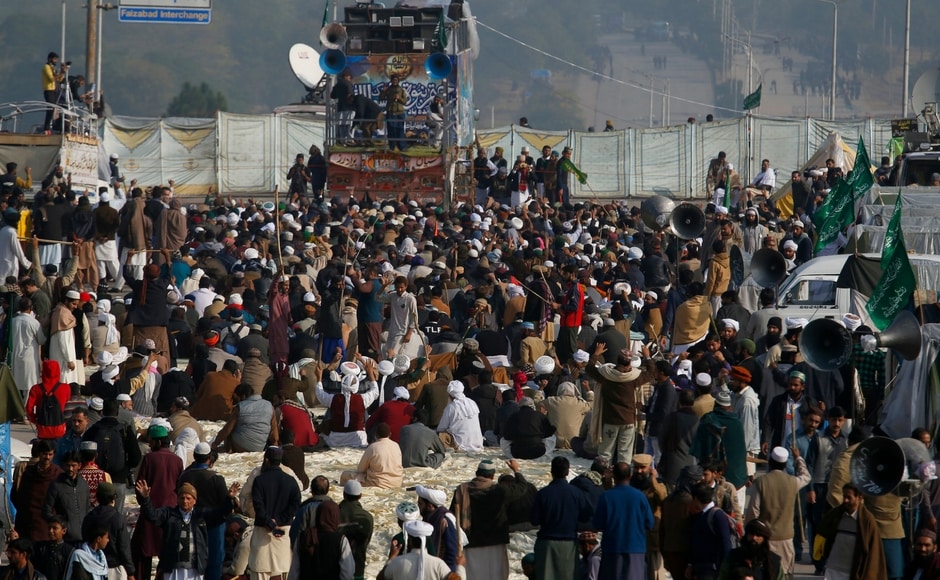 More than 3,000 Islamists camped out on the edge of Pakistan's capital, demanding the removal of the country's law minister Zahid Hamid over a omitted reference to Prophet Muhammad in a constitutional bill. AP Pakistan officials defer crackdown on protesters demanding removal of law minister Zahid Hamid