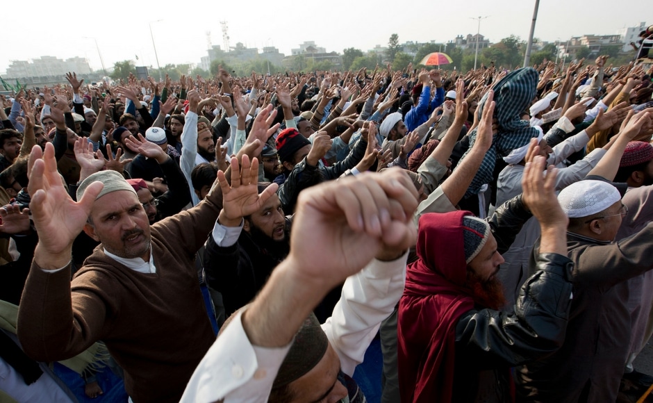The rally began with a few hundred members of the small radical Tehreek-i-Labaik Ya Rasool Allah party, who had gathered earlier this week at the main Faizabad crossing outside Islamabad. AP Pakistan officials defer crackdown on protesters demanding removal of law minister Zahid Hamid